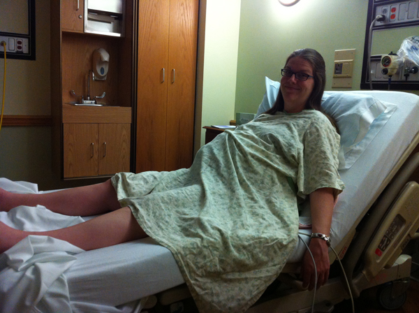 Getting ready to give birth, three weeks early.